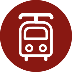 Rotes Symbol einer Sprechblase mit einer Straßenbahn.